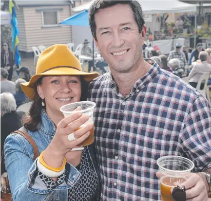  ?? ?? CHEERS: Mel and Adam McEvoy enjoy the 2019 Hampton Food and Arts Festival, taking advantage of the local product on display.