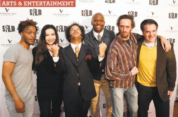  ?? Photos by Carlos Avila Gonzalez / The Chronicle ?? Actor Jermaine Fowler (left), producer Nina Yang Bonjovi, Boots Riley, actor Terry Crews, actor Michael Sommers, and producer George Rush hit the red carpet at the Grand Lake Theater in Oakland for SFFilm’s second premiere screening of Riley’s debut...