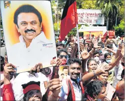  ?? AFP ?? DMK members celebrate the party’s win in the state elections, in Chennai on Sunday.