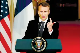  ??  ?? FRENCH PRESIDENT Emmanuel Macron speaks during his joint news conference with US President Donald Trump in the White House yesterday.