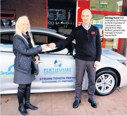  ??  ?? Driving forceVicki Unite picks up the keys for Perth Chamber of Commerce’s new vehicle from Miles Redford, general sales manager at Struan Toyota Perth