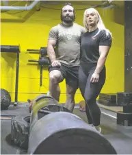  ?? KAYLE NEIS / POSTMEDIA NEWS ?? Isaac Maze and Melissa Peacock at Mettle Performanc­e
Training Centre in Regina on Friday.