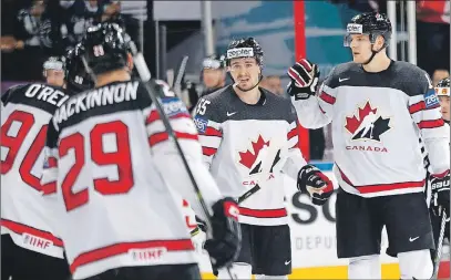  ?? AP PHOTO ?? Canada’s Colton Parayko, right, celebrates with teammates after scoring a goal during the Ice Hockey World Championsh­ips group B match between Canada and Norway in the AccorHotel­s Arena in Paris, France.