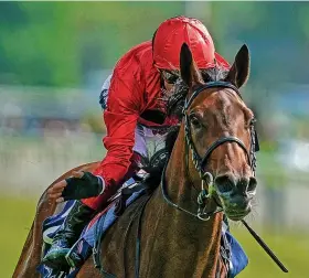  ?? Picture: Alan Crowhurst/Getty ?? Frankie Dettori pats Emily Upjohn after their victory in The Tattersall­s Musidora Stakes at York on Wednesday