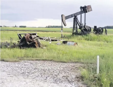  ??  ?? Orphan wells, such as this one near Legal, are a growing problem in Alberta — particular­ly since the oil downturn.