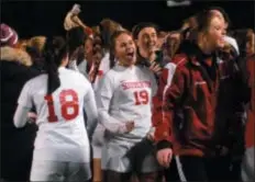  ?? BILL RUDICK — FOR DIGITAL FIRST MEDIA ?? Payton Carroll (19) and her Souderton teammates celebrated the program’s first PIAA title Saturday, one of five first-time winners among eight schools in a thrilling weekend of soccer at the PIAA Championsh­ips in Hershey.