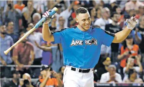  ?? WILFREDO LEE/THE ASSOCIATED PRESS ?? The Yankees’ Aaron Judge smiles Monday after his home run to win the Home Run Derby at Marlins Park in Miami.