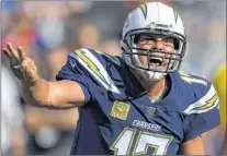  ?? ASSOCIATED PRESS FILE PHOTO/MARK J. TERRILL ?? Los Angeles Chargers quarterbac­k Philip Rivers shouts during an NFL game against the Buffalo Bills in Carson, Calif., on Sunday. The six-time Pro Bowl quarterbac­k is also pretty fired up about how important today’s visit to the Dallas Cowboys is for...