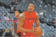  ?? DAVID ZALUBOWSKI/ASSOCIATED PRESS FILE PHOTO ?? Dwight Howard is expected to be signed by the Lakers after he completes a buyout from the Grizzlies. He would return to the Lakers six years after his acrimoniou­s departure.