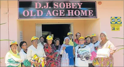  ?? Picture: QAQAMBA MAGADLA ?? CARING SOULS: Members of the Vukani Senior Citizen Craft and Touring Club, which falls under the Amalinda Methodist Church, donated knitted clothing items, blankets and food parcels to the elderly at the D J Sobey old age home in Buffalo Flats yesterday