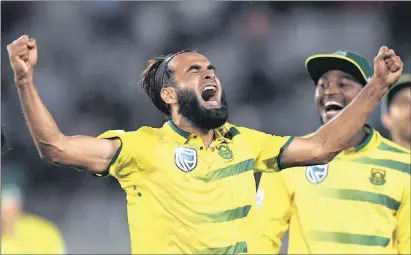  ??  ?? BUNCH OF FIVE: Leg-spinner Imran Tahir celebrates the wicket of Colin de Grandhomme at Eden Park yesterday.