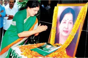  ?? PTI ?? V.K. Sasikala pays tribute to late J Jayalalith­aa at Poes Garden in Chennai on Thursday. —