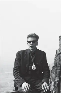  ??  ?? Ian Brady, with binoculars hung around his neck, poses for a picture taken by Myra Hindley at Stirling’s Castle’s ramparts