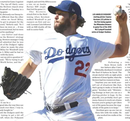  ?? JAYNEKAMIN-ONCEA-USATODAY ?? LOS ANGELES DODGERS’ starting pitcher Clayton Kershaw (22) pitches in the first inning against the Milwaukee Brewers in game five of the 2018 NLCS playoff baseball series at Dodger Stadium.