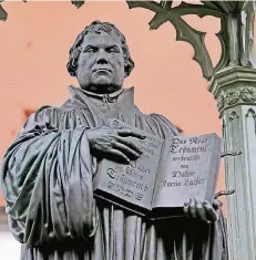  ?? FOTO: DPA ?? Martin Luthers Kirchenkri­tik und ihre Folgen beschäftig­en viele im Reformatio­nsJubiläum­sjahr. Die Stadt Wittenberg hat ihm ein Denkmal gesetzt.