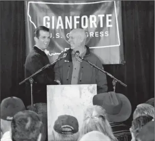  ?? The Associated Press ?? GIANFORTE: In this May 11, 2017, photo Republican Greg Gianforte, right, welcomes Donald Trump Jr., the U.S. president’s son, onto the stage at a rally in East Helena, Mont. Gianforte, charged with shoving a reporter to the ground on the eve of a...