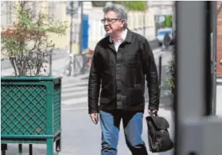  ?? // AFP ?? Mélenchon llega ayer a la sede de su partido en París