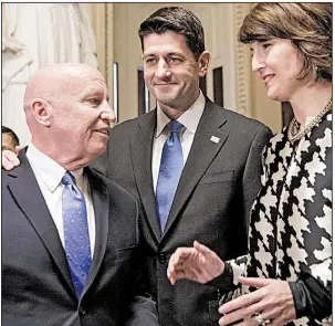  ?? AP/J. SCOTT APPLEWHITE ?? House Ways and Means Committee Chairman Kevin Brady (from left) joins House Speaker Paul Ryan and Rep. Cathy McMorris Rodgers, R-Wash., Tuesday after the House passed the tax bill.