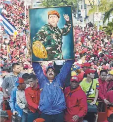  ?? AFP ?? Venezuela rojo Chávez. Maduro, heredero en decadencia.