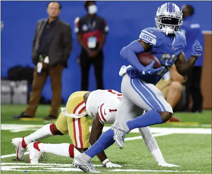  ?? LON HORWEDEL — THE ASSOCIATED PRESS ?? Detroit Lions running back D’Andre Swift runs for a 43-yard touchdown reception during Sunday’s home loss to the San Francisco 49ers.