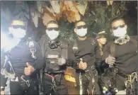  ??  ?? The last four Thai Navy SEALs come out safely after completing the rescued mission inside the flooded cave.