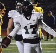  ?? MATTHEW B. MOWERY — FOR MEDIANEWS GROUP ?? Birmingham Groves’ Johnny Rex celebrates after one of his two touchdown runs in a 36-0 win over Avondale in the opening round of the Division 2 district playoffs Friday.