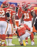  ?? JAY BIGGERSTAF­F/ USA TODAY SPORTS ?? Chiefs quarterbac­k Patrick Mahomes ( 15) is slow to get up after being injured against the Browns last Sunday.