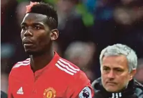  ??  ?? Paul Pogba (left) and Manchester United manager Jose Mourinho.