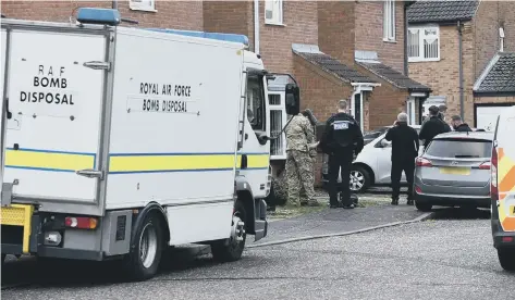  ??  ?? Police and the bomb disposal unit at Uldale Way, Gunthorpe