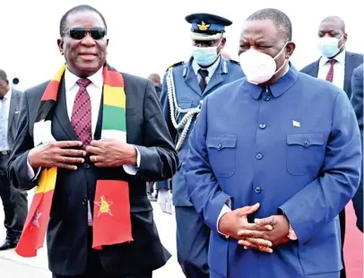  ?? ?? President Mnangagwa is welcomed by Vice President Dr Constantin­o Chiwenga at Robert Gabriel Mugabe Internatio­nal Airport in Harare yesterday from Abidjan, Cote d’Ivoire, where he attended the Africa Investment Forum 2022. — Picture: Joseph Nyadzayo