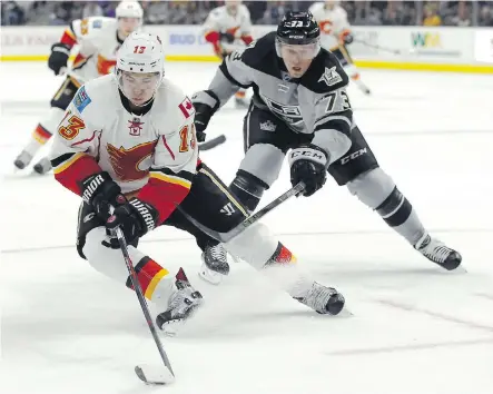  ?? THE ASSOCIATED PRESS ?? Flames young guns Johnny Gaudreau and Sean Monahan have combined for six goals and 13 points in 14 games this season.