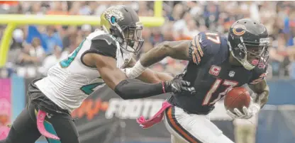  ??  ?? The Bears’ Alshon Jeffery breaks away from Jacksonvil­le cornerback Jalen Ramsey Oct. 16 at Soldier Field. | JEFF ROBERSON/ AP