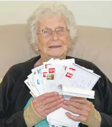  ??  ?? Joyce Draper collects stamps to raise funds for people suffering from leprosy.