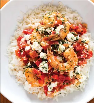  ?? Associated Press photo ?? This undated photo provided by America's Test Kitchen shows Greek-Style Shrimp with Tomatoes and Feta.