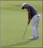  ??  ?? Francesco Molinari of Italy putts a birdie on the 18th green after the final round for the 147th British Open Golf championsh­ips in Carnoustie, Scotland, Sunday, July 22, 2018. AP PHOTO/ MARTIN CLEAVER