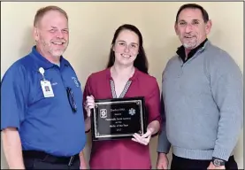  ?? CONTRIBUTE­D PHOTO ?? Sarah Laymon, pictured center, was recognized as the 2017 Paramedic of the Year presented by Gordon EMS. Also pictured are Deputy Director Donald Bowen, left, and Director Michael Etheridge, right.