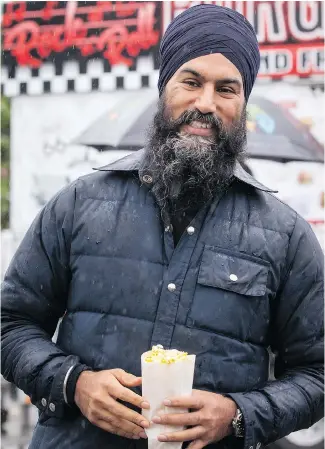  ?? DARRYL DYCK / THE CANADIAN PRESS ?? NDP Leader Jagmeet Singh has a certain charm about him. He likes to ask those in Burnaby for their first language, and claims to be able to say “How are you?” in 40 languages.