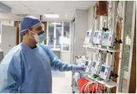  ?? (Special to The Commercial) ?? Dr. Ali Alnashif, a pulmonolog­ist and head of the ICU at Jefferson Regional Medical Center, took care of the first patient in Arkansas to test positive for covid.