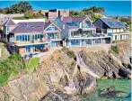 ??  ?? AGENT Savills
With panoramic views of Cardigan Bay, this house has steps down to the sea.