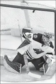  ?? AP/JEFF ROBERSON ?? A shot by St. Louis’ Colton Parayko sails over the head of Minnesota goalie Devan Dubnyk for a goal during the first period of the Blues’ 3-1 victory in an NHL Western Conference series.