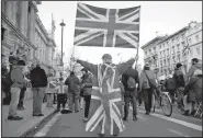  ?? AP/TIM IRELAND ?? Demonstrat­ors participat­e in a pro-Brexit rally Sunday in London.