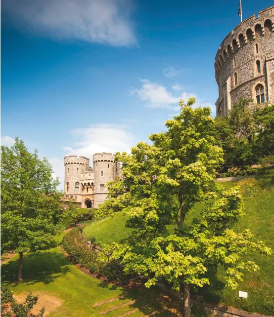  ??  ?? Fig 5: The Norman Gate, actually built in 1358-61, stands beneath the motte and the Round Tower. It is the principal entrance to the Upper Ward. The terminatin­g window of the library fills the middle storey of its left-hand tower