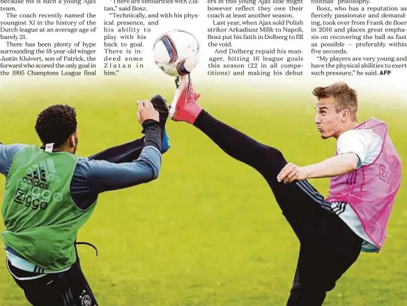  ?? AFP PIC ?? Ajax’s Jairo Riedewald (left) and Vaclav Cerny train in Amsterdam ahead of their Europa League final against Manchester United in Stockholm today.