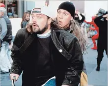  ?? EI SCAN ?? Kevin Smith and Jason Mewes in a scene from the 2001 movie “Jay And Silent Bob Strike Back,” in which they play two pot-selling burnouts.