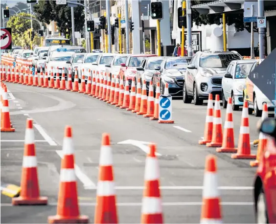  ?? Photo / Jason Oxenham ?? Roadworks on Auckland’s Quay St are because of repairs to the wall that stops the city crumbling into the sea.