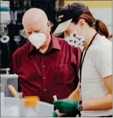  ?? ?? Dr. Robert Sutherland, shown on the left, and his lab will determine the dose range of active ingredient­s that will be used in human trials and will identify potential side effects.