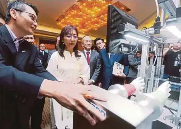  ?? PIC BY ROHANIS SHUKRI ?? Primary Industries Minister Teresa Kok attending the launch of the new Malaysian Rubber Export Promotion Council fund in Kuala Lumpur yesterday.