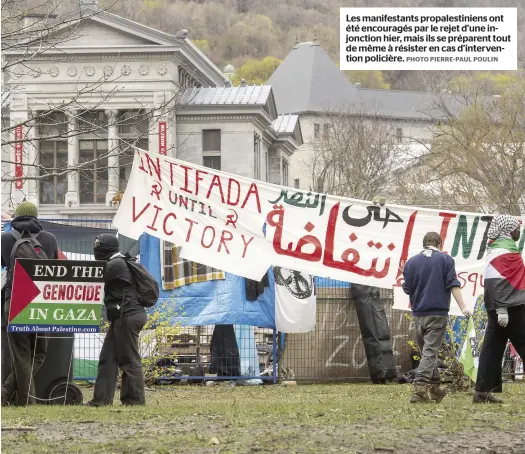  ?? PHOTO PIERRE-PAUL POULIN ?? Les manifestan­ts propalesti­niens ont été encouragés par le rejet d’une injonction hier, mais ils se préparent tout de même à résister en cas d’interventi­on policière.