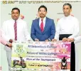  ??  ?? From Left to Right - Mr. Ushan Wijewarden­a – Head of Marketing and Business handing over the sponsorshi­p to principals of both schools