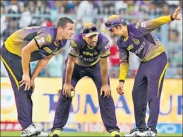  ?? AFP ?? KKR captain Gautam Gambhir (right) has led his boys from the front. The likes of Yusuf Pathan and Nathan CoulterNil­e have responded.